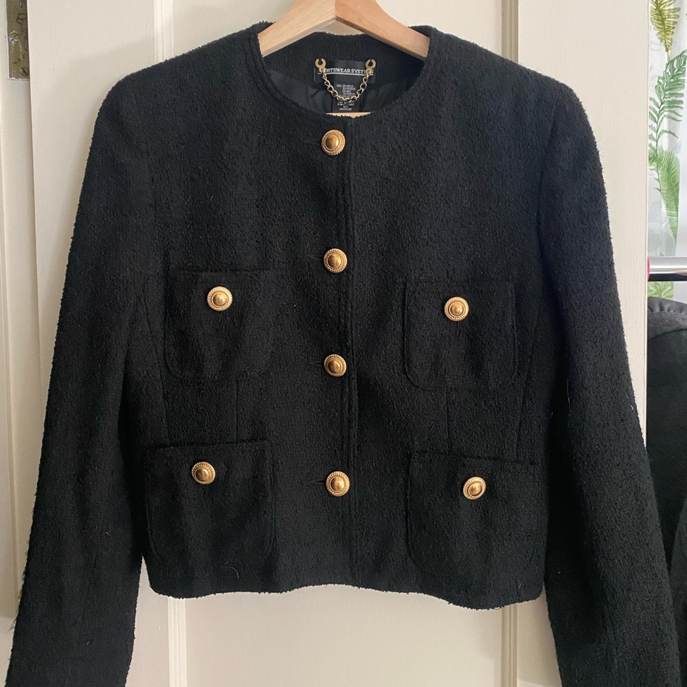 Black jacket with gold buttons
